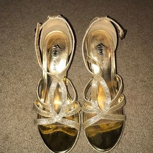 Gold high heels